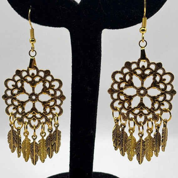 Kultaiset Sulkakorvakorut