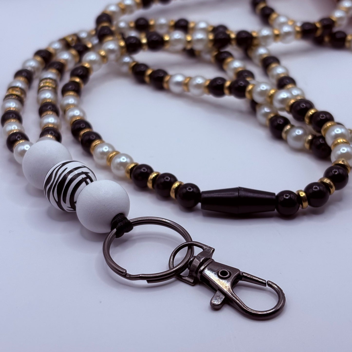 Avainnauha olan yli, musta-valkoinen-kulta 160 cm