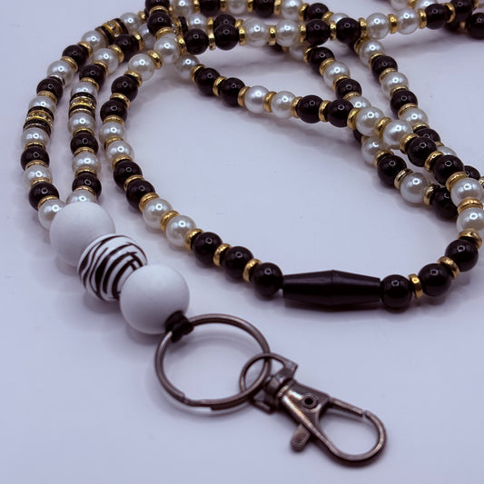 Avainnauha olan yli, musta-valkoinen-kulta 160 cm